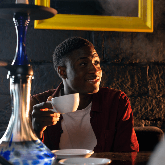 Guest enjoying a hot drink at the lounge